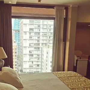 https://edificio-akros.hotelsquito.com